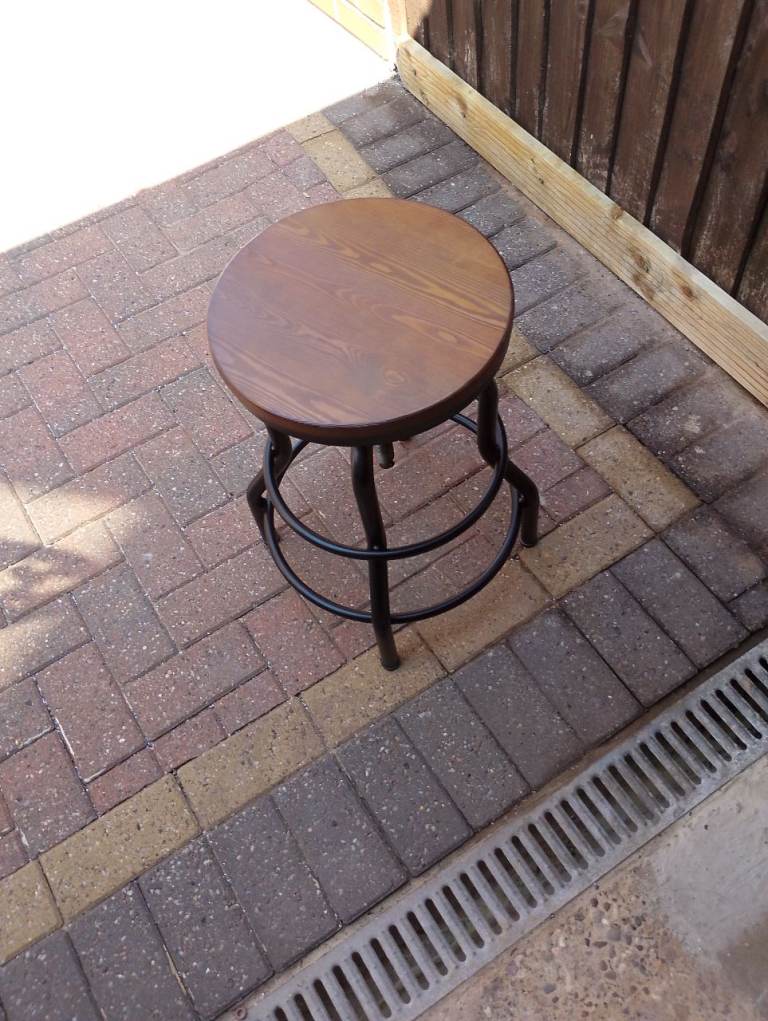 Solid metal adjustable stool with solid wooden top