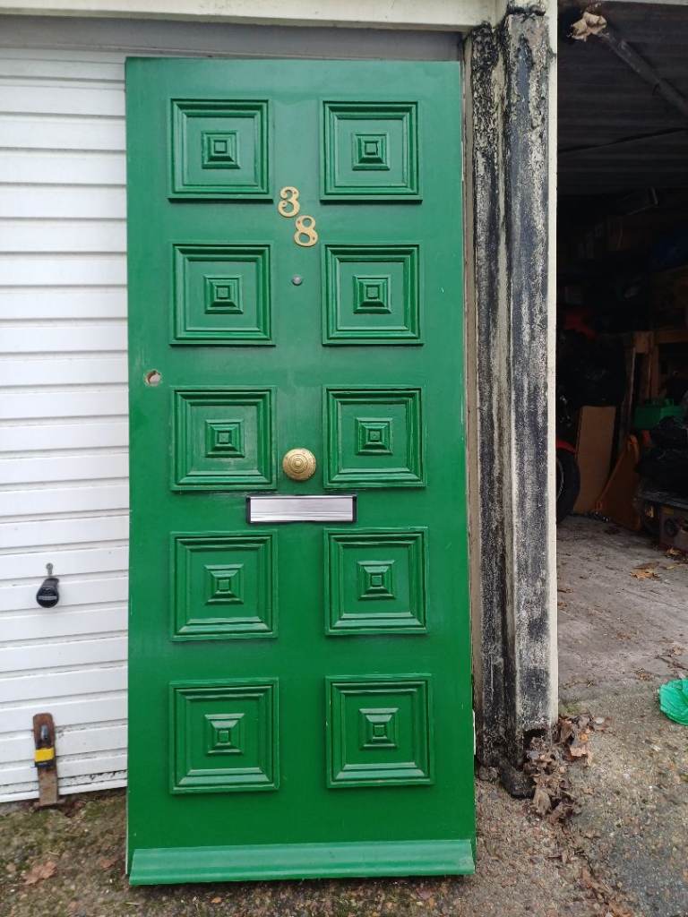 Wooden front door. Live in a castle or tudor mansion?