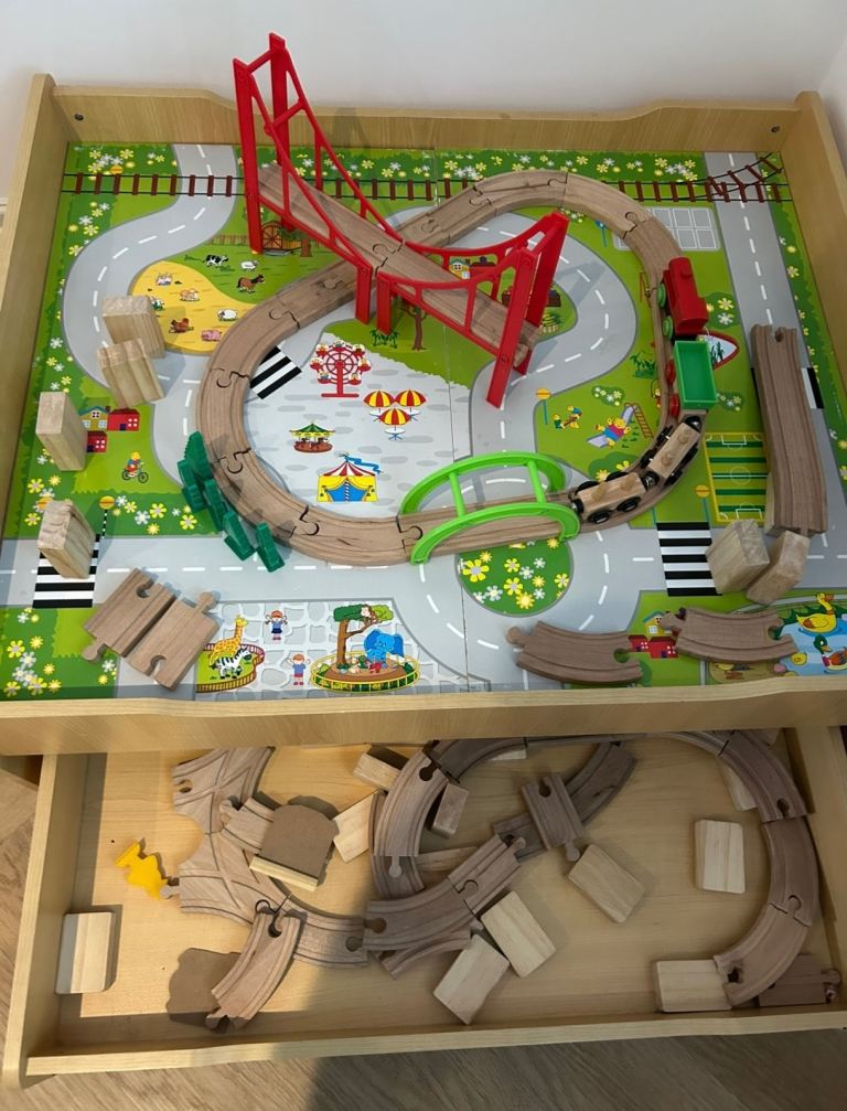 Wooden train table and storage