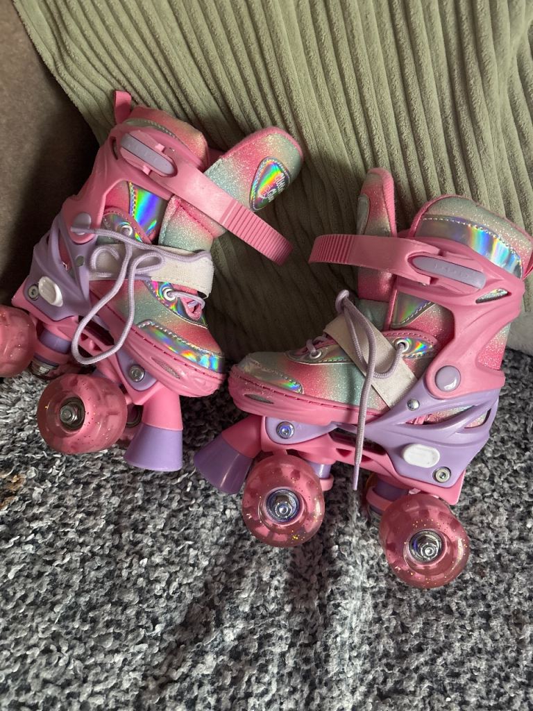 Brand new- size 9-12 Girls Pink & Purple Adjustable Roller Skates – Good Condition