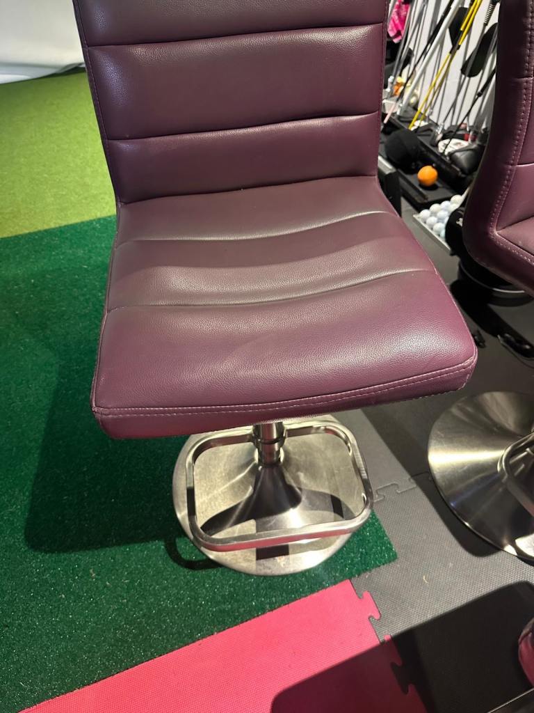 Pair of Purple swivel bar stools