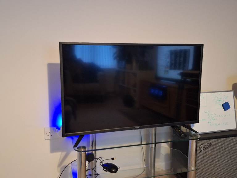 TV and glass TV stand