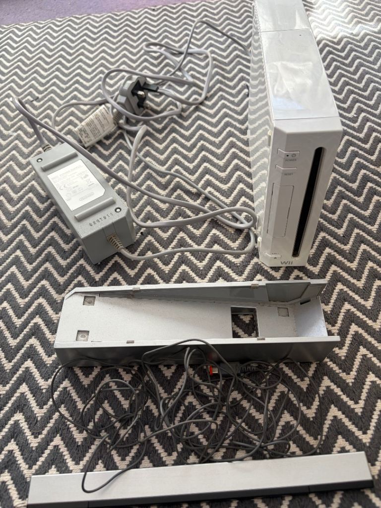 Nintendo Wii console, leads, controllers, manuals, balance board, guitar 