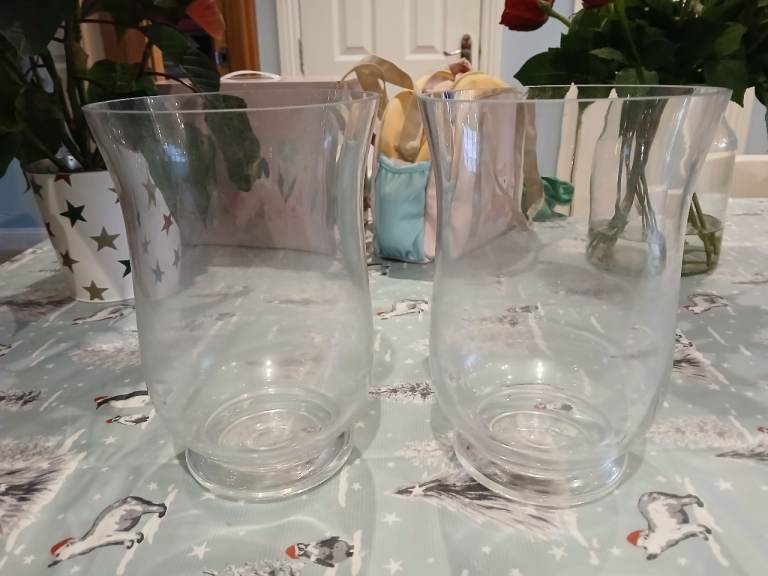 Glass storm lanterns.