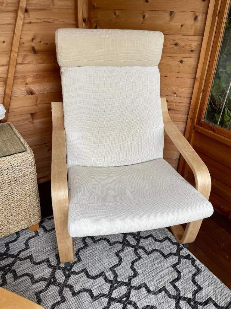 image for 2 Ikea Po-ang Chairs with Cream Cushions