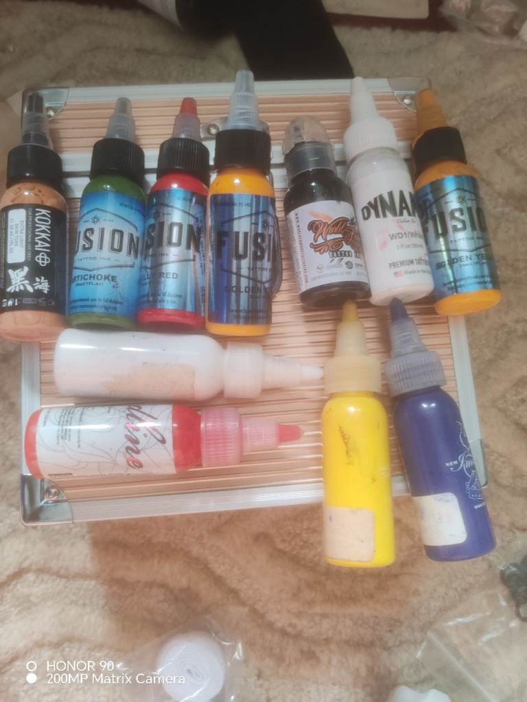 Job lot of tattoo inks and machine and other items. Collection from Saltburn 