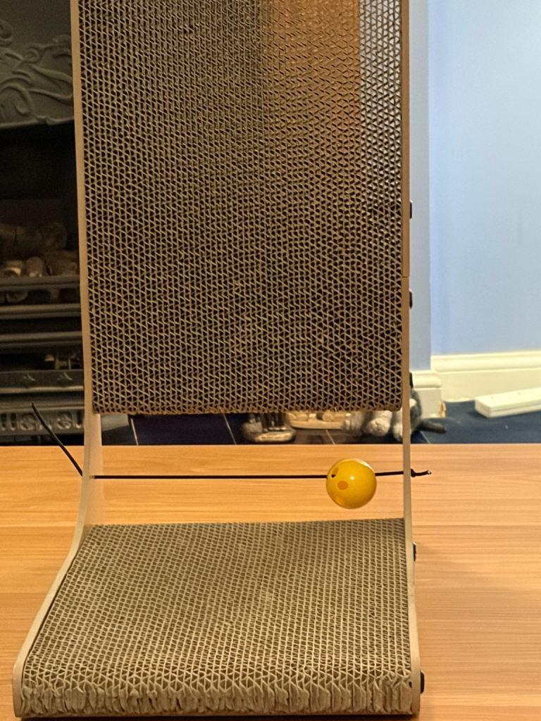 IKEA Utsadd cat house and L shaped layered cardboard cat scratching post