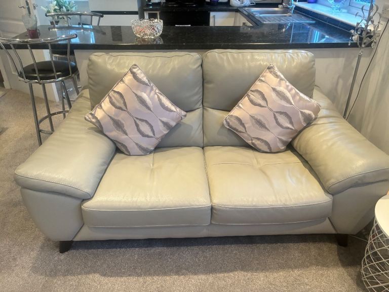 Leather 2 seater and chair in pale grey 