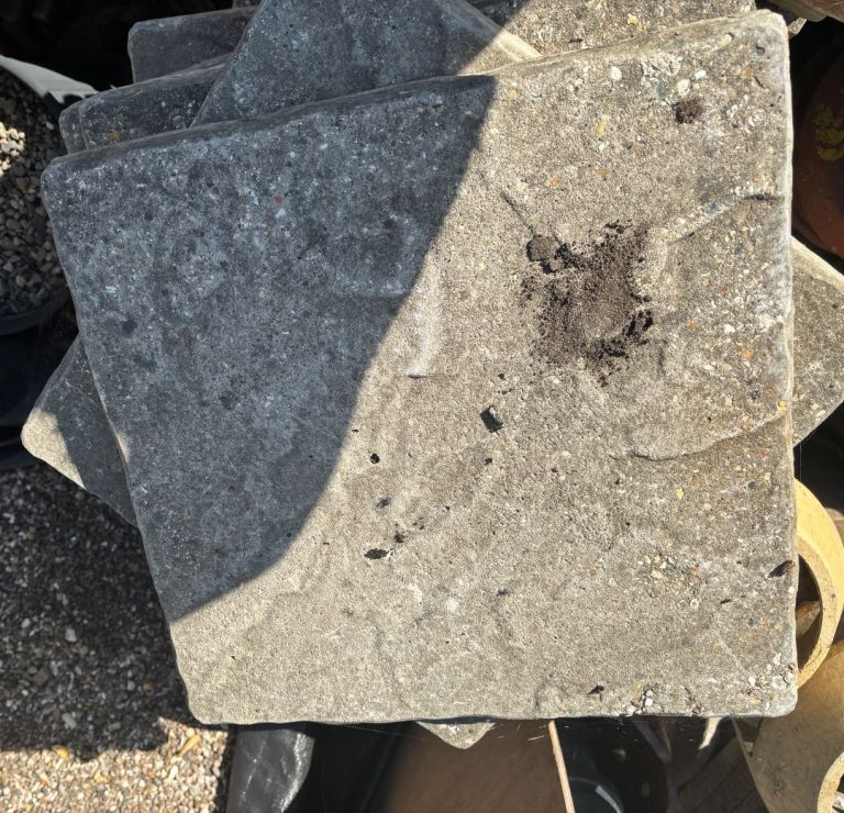 Mixed sized paving slabs