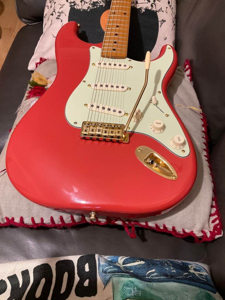 Fender Stratocaster with upgraded Fender gold hardware   