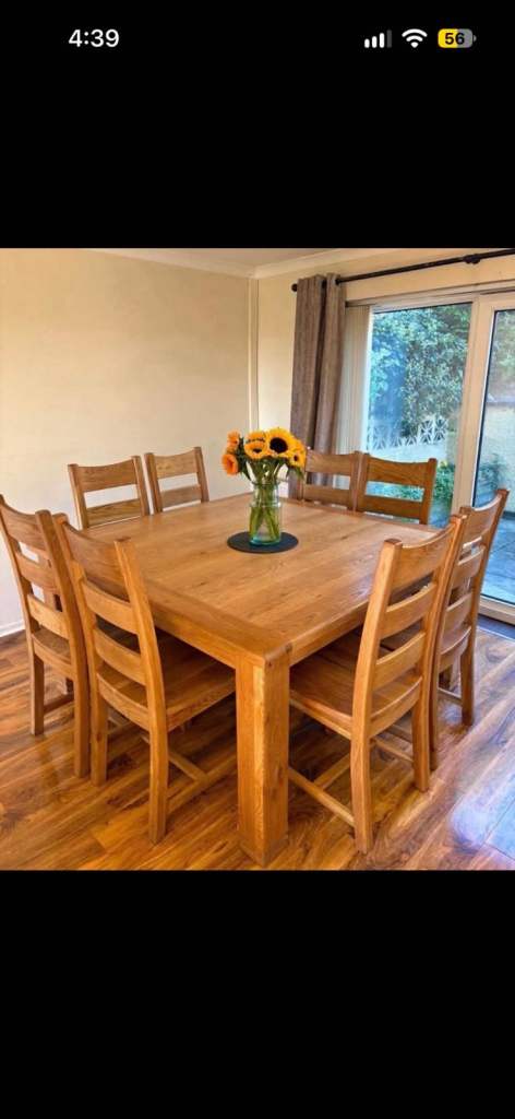 Wooden dining table and chair set. Unique square design 