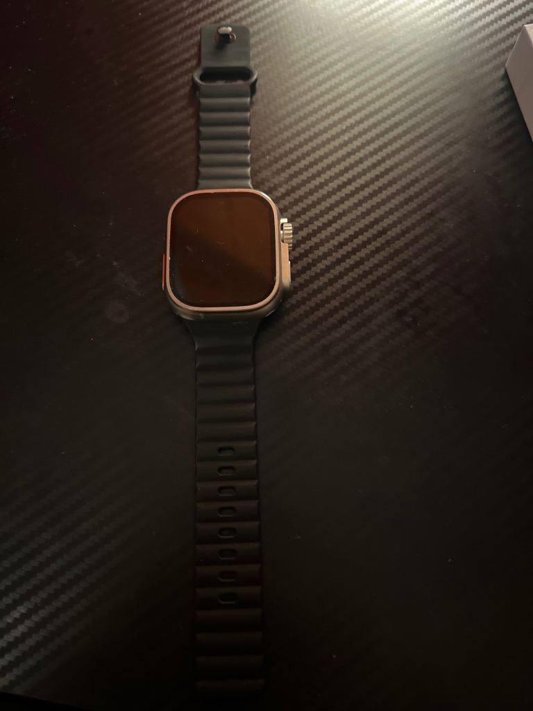 Smartwatch with Black Strap – Good Condition