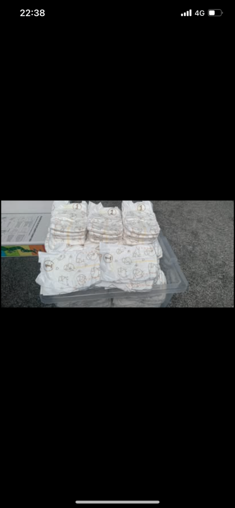 baby clothes/nappies/breast pads/and baby bath 