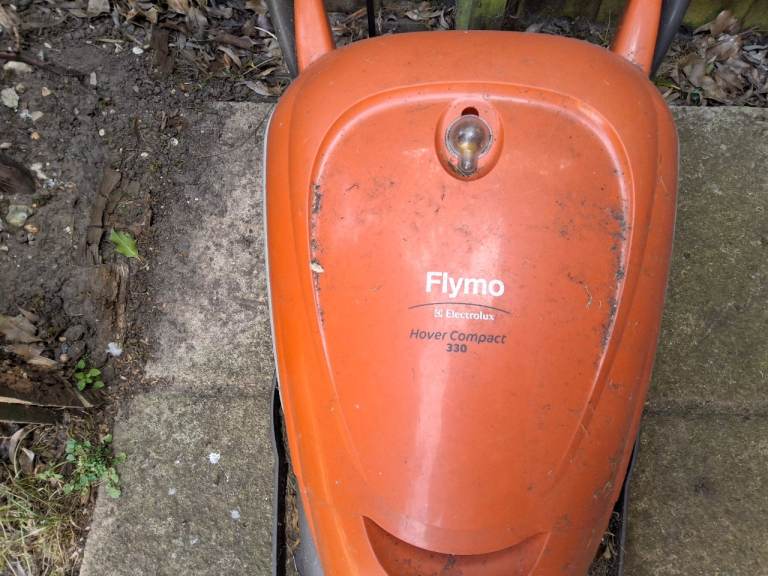 Flymo lawnmower and Vax pet cordless vaccum