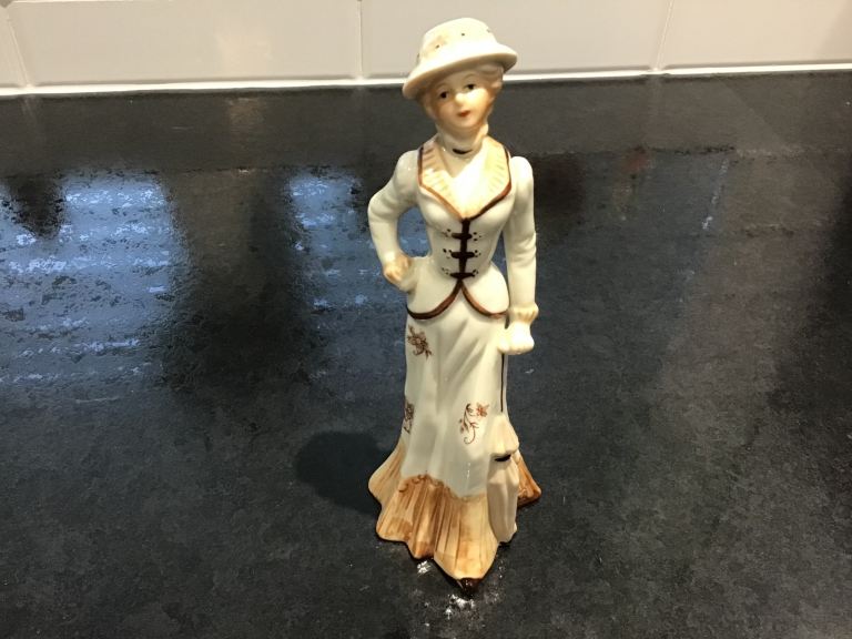 Elegant Lady porcelain figurine 9” high 