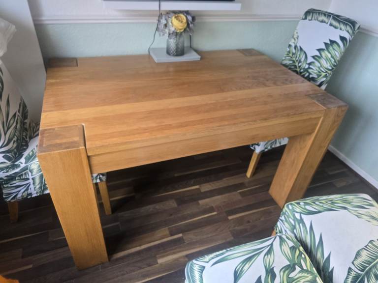 Oak dining table and 4 chairs 