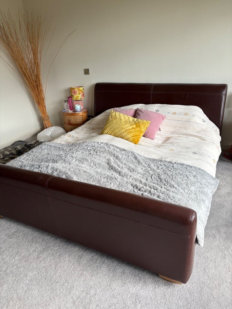 Super King size leather sleigh bed frame.