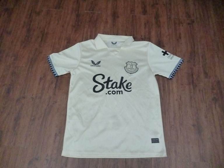 Official 24/25 Everton home shirt with Christopher Ward sleeve sponsor size L