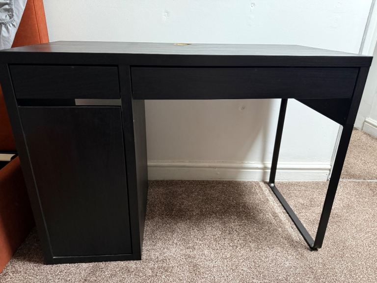 IKEA black micke desk *used*. Pickup and cash only