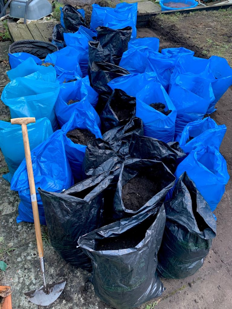 Free soil/rubble. Bagged ready to go