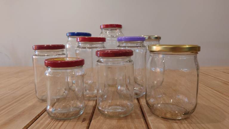 9 glass jars with lids.