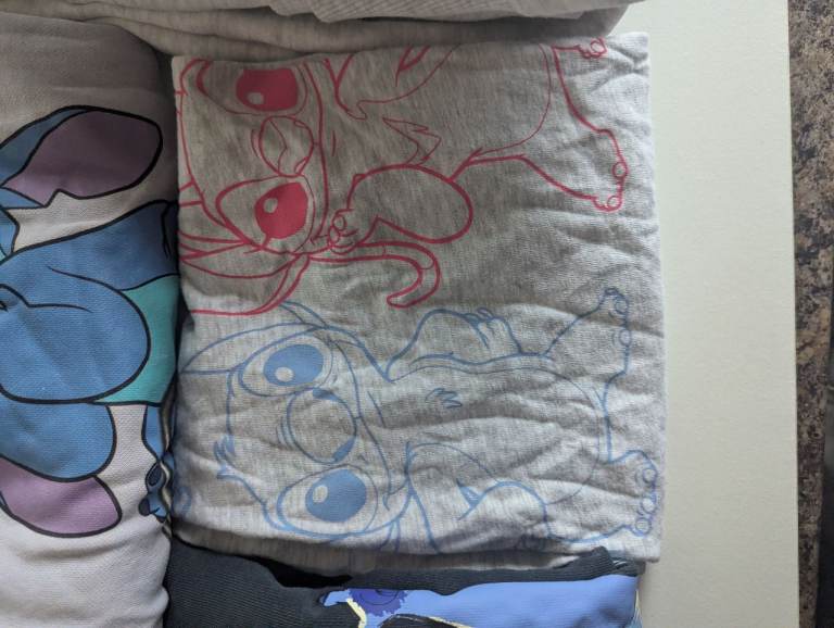 Bundle of Stitch character clothes for 8-10 year old