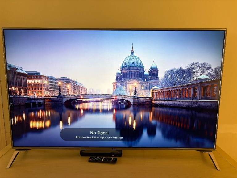 LG 55" TV with remote and stand