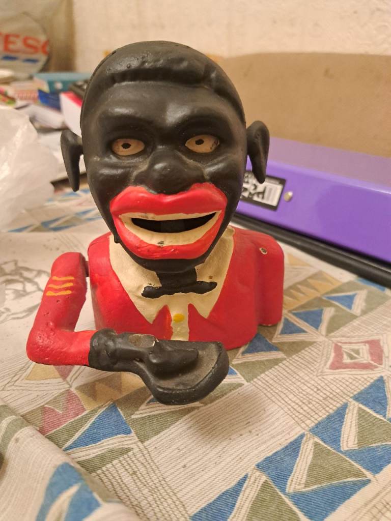 Vintage Black Americana Mechanical Bank - Red Jacket