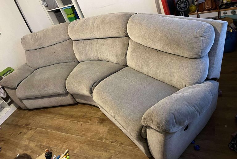 Scs Curved grey reclining sofa 