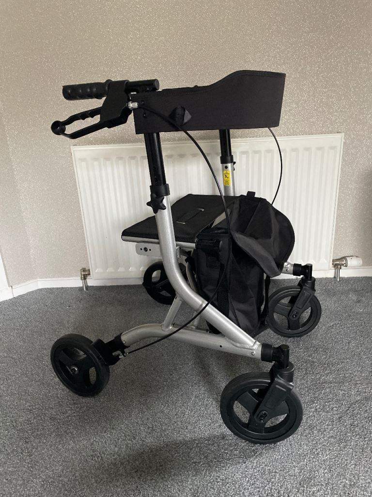Zoom plus 4 wheeled lightweight mobility walker with seat and storage, folds compactly 