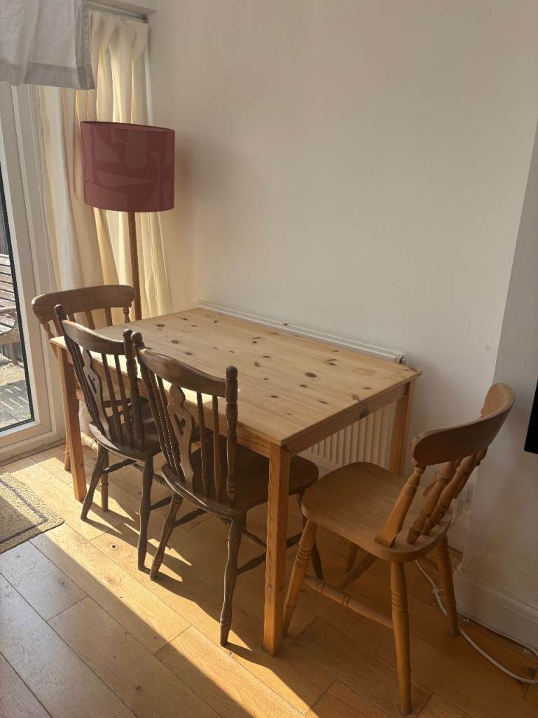 Pine Dining Table with Four Wooden Chairs – Good Condition