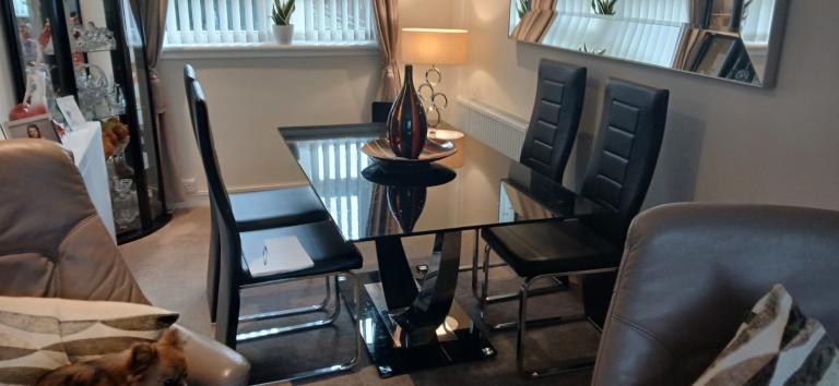 Glass dinning table and chairs