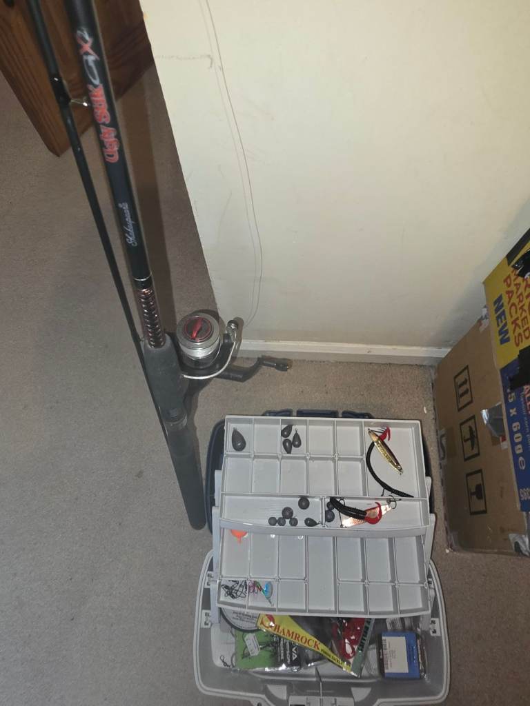 Fishing rod with bait box and accessories 