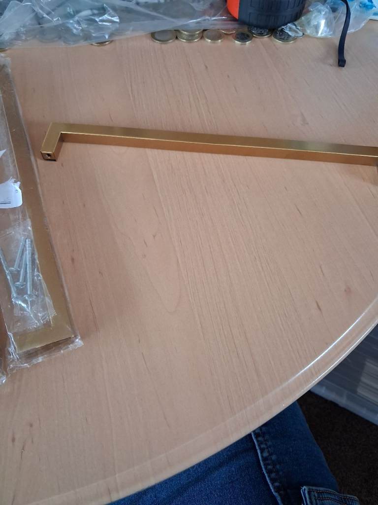 9x new gold metal kitchen cupboard door handles new in packaging with screws ect.