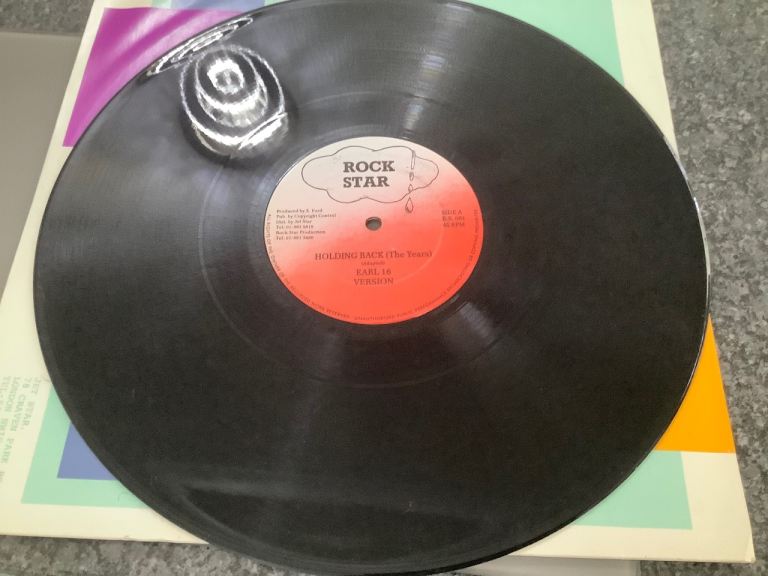 Earl 16 “holding back” 12” Reggae vinyl