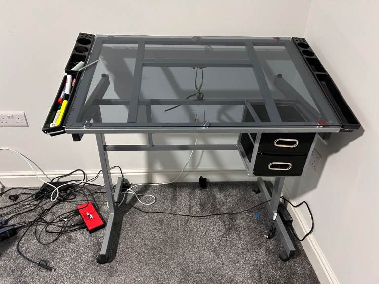 Adjustable Glass desk with a tilting top 