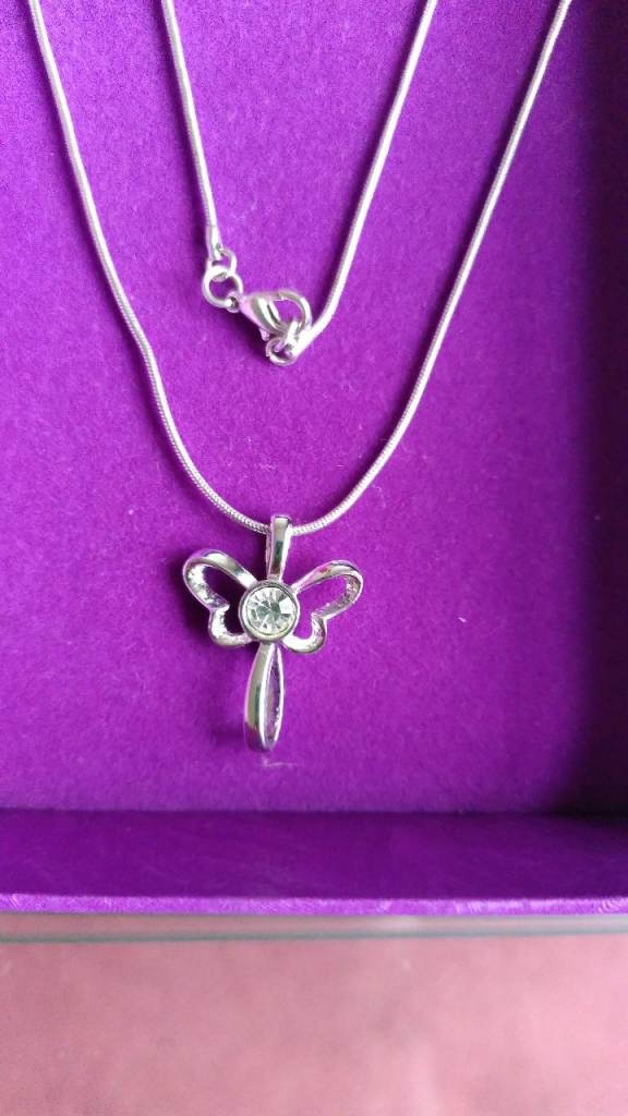 Silver coloured necklace with butterfly pendant 