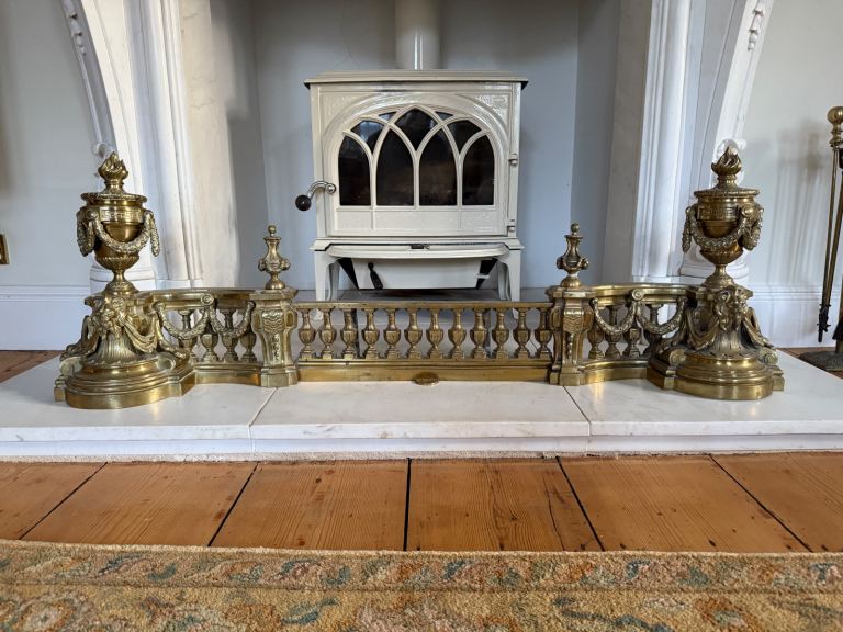 Large brass fender urn finial swags & lion heads 