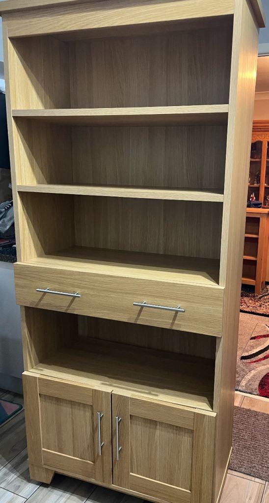 Tall bookcase with cupboard and drawer 