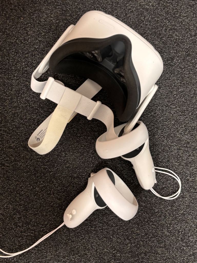Oculus Quest 2 VR Headset and Controllers – Good Condition