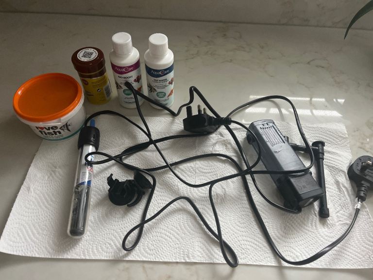 Tropics fish food, and heater, filter