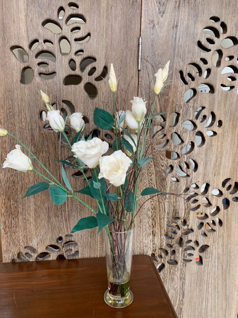 Vase of Artificial White Roses
