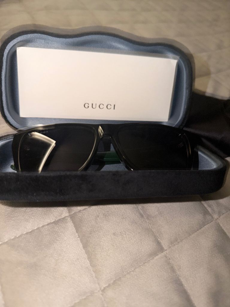 Gucci sunglasses (never worn)