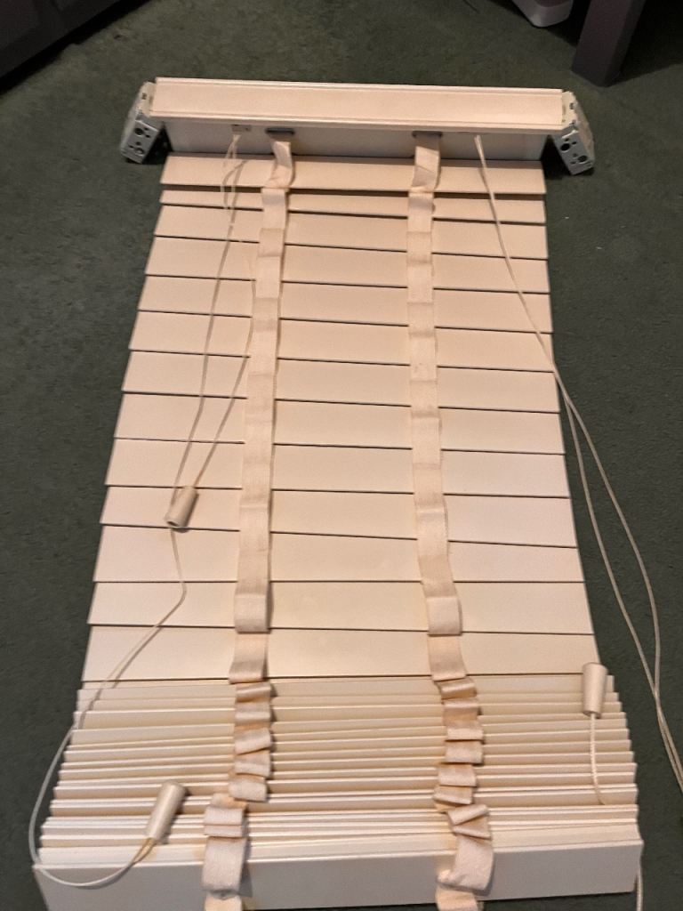 Wooden blinds with tape