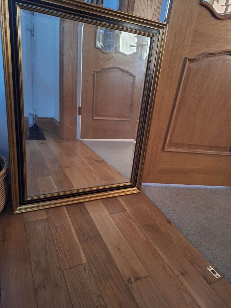 Gold and Black framed mirror