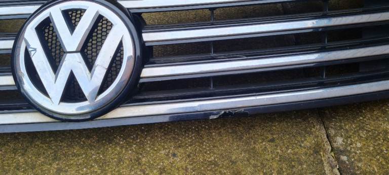 Front grill , plastic trim for bumper, left day lamp 