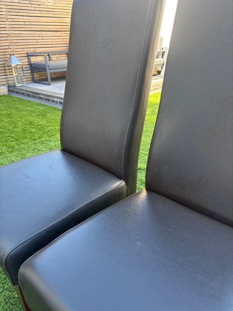 Brown Leather Chairs.