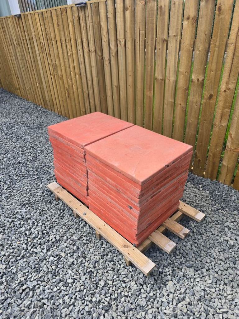 Terracotta coloured paving slabs- stack of 34