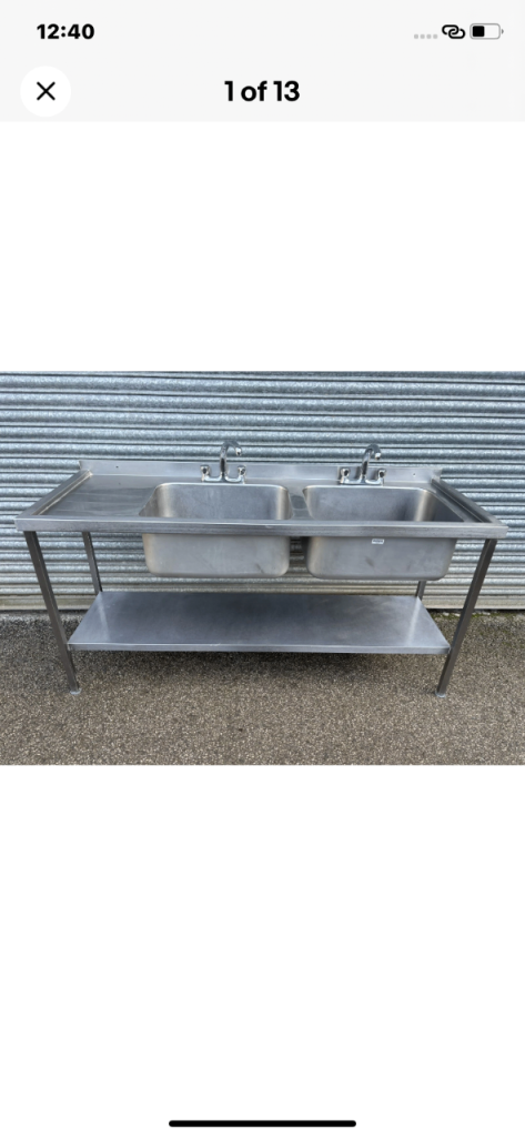 Commercial Stainless Steel Double-Bowl Sink unit with a left-hand drainer. 