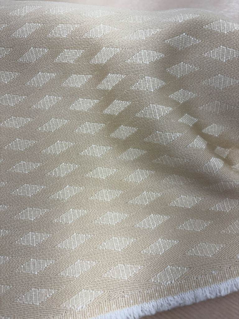 3 metres of light tan/gold diamond pattern fabric